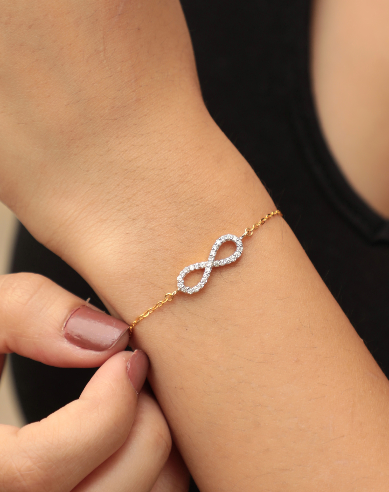 Gold infinity 2025 bracelet with diamonds