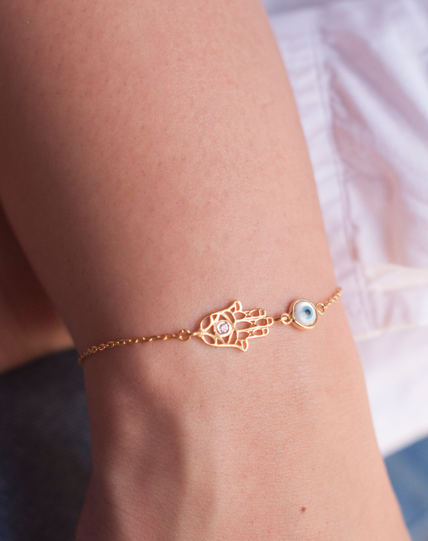 Evil eye online hand bracelet